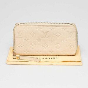 Louis Vuitton Ivory Monogram Empreinte Leather Secret Long Wallet